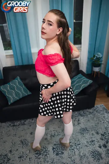 Trans Woman Strips Off Her Top and Poses Nude to Display Her Body