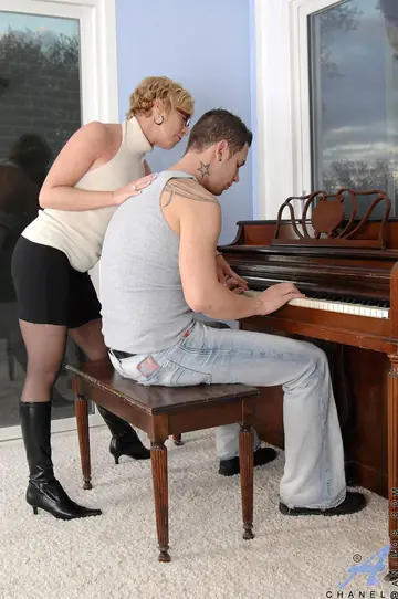 Mature Blonde in Stockings and Boots Takes Anal and a Facial at the Piano
