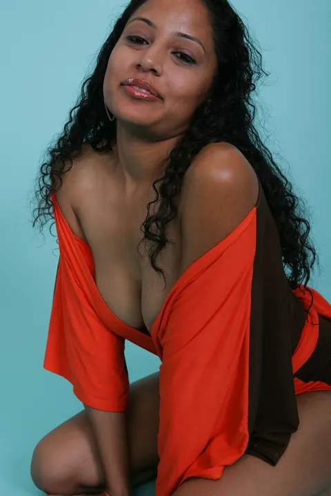Curly Mexican Ebony MILF in a Skirt Bares Her Big Tits and Smiles – photo 9 of 20