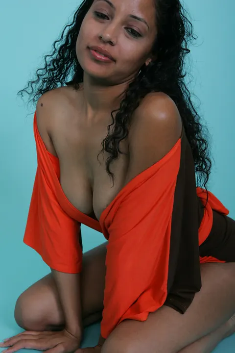 Curly Mexican Ebony MILF in a Skirt Bares Her Big Tits and Smiles – photo 10 of 20