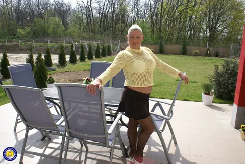 Mature Blonde MILF with Big Tits Uses a Dildo on the Sofa – photo 1 of 21