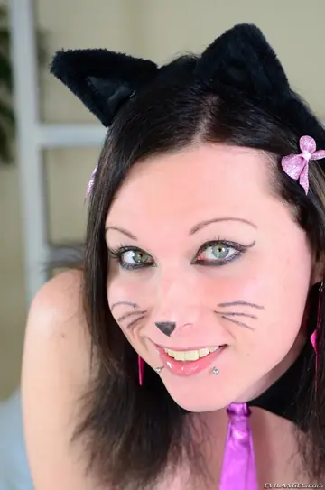 French Trans Woman in Latex Poses Nude and Gives a Blowjob