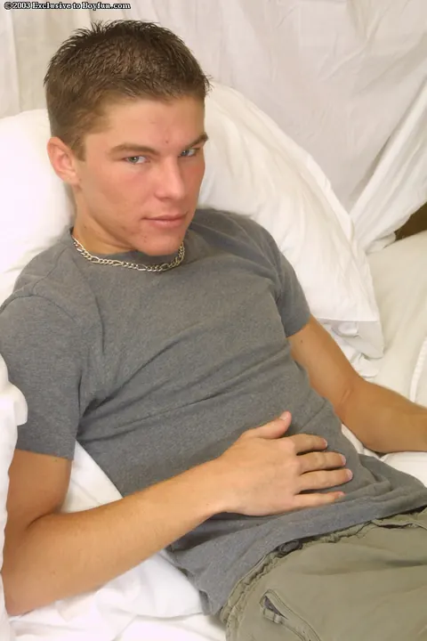 Thick Guy Strips and Strokes His Cock on the Bed – photo 1 of 21