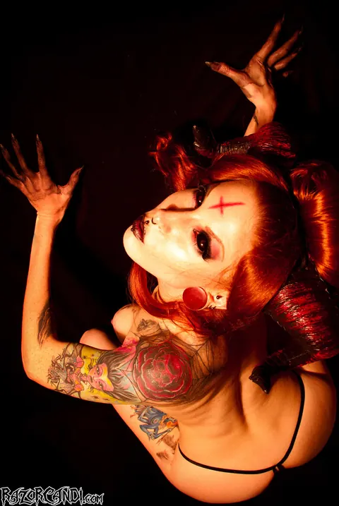 Razor Candi: Slim Redhead MILF Shows Off Her Big Natural Tits and Tattoos – photo 15 of 15
