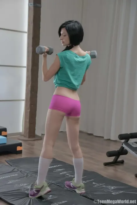 Lina Arian: Slim Brunette in Pigtails Rides Her Trainer in the Gym – photo 10 of 16