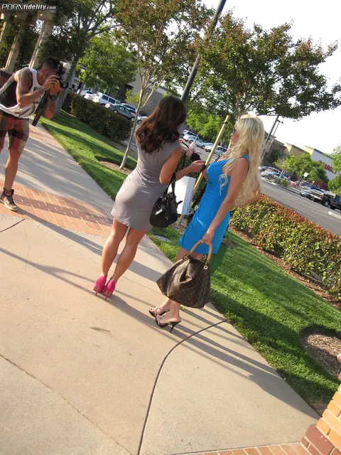 Evita Pozzi: Tall Blonde MILF Flaunts Her Big Tits in a Public Threesome – photo 20 of 20