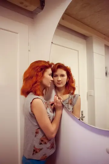 Petite Redhead Slips Off Her Panties and Spreads