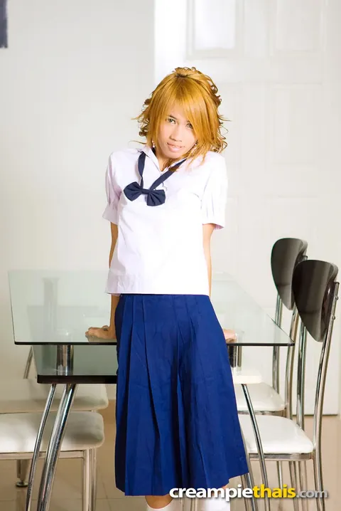 Slim Thai Redhead in Uniform Spreads Her Shaved Pussy – photo 1 of 20