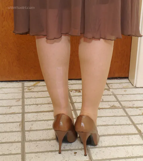 Mature Blonde Flashes Stocking Tops in a Skirt and Heels – photo 6 of 16