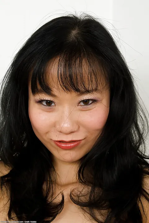 Niya Yu: Busty Asian MILF Spreads Her Pussy in Socks – photo 12 of 16