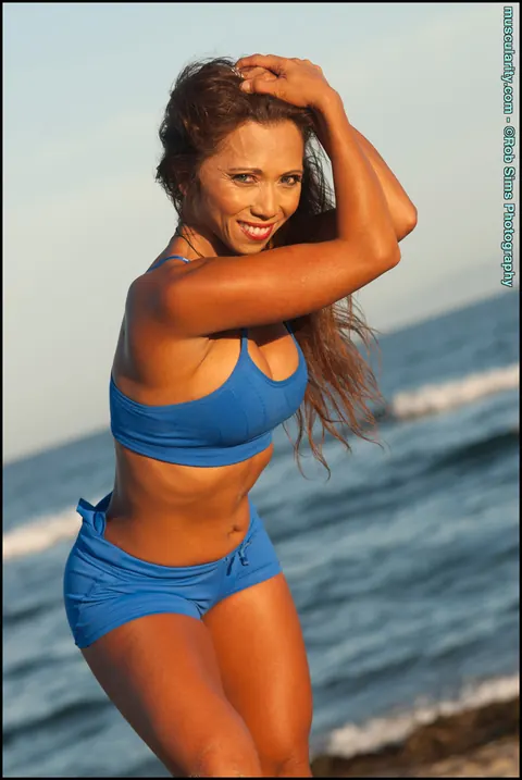 Asian MILF Poses in a Bikini, Shorts, and Leather on the Beach – photo 2 of 15
