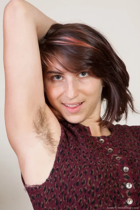Zooey: Hairy Brunette in Panties Spreads Her Pussy on the Sofa – photo 2 of 17