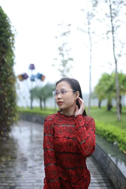 Asian Brunette Poses in Glasses Outdoors in a Public Place – photo 13 of 21