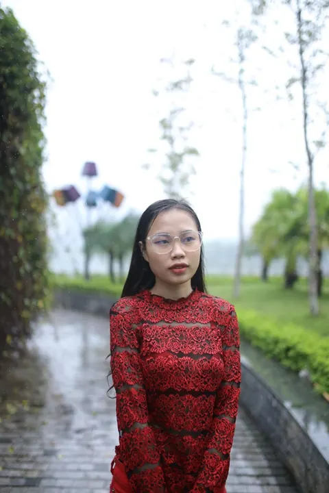 Asian Brunette Poses in Glasses Outdoors in a Public Place – photo 16 of 21