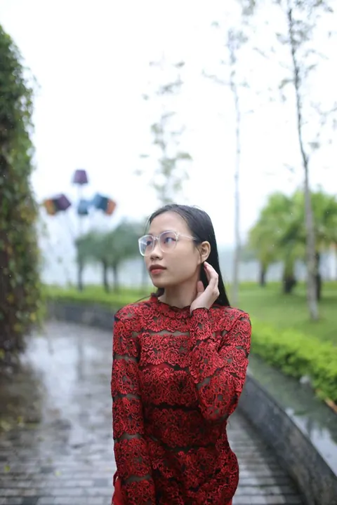Asian Brunette Poses in Glasses Outdoors in a Public Place – photo 12 of 21