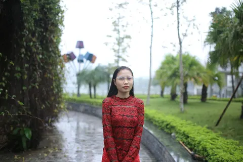 Asian Brunette Poses in Glasses Outdoors in a Public Place – photo 17 of 21