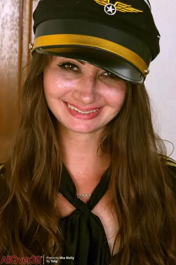 Slim MILF Strips Out of Her Uniform and Panties and Spreads Her Pussy
