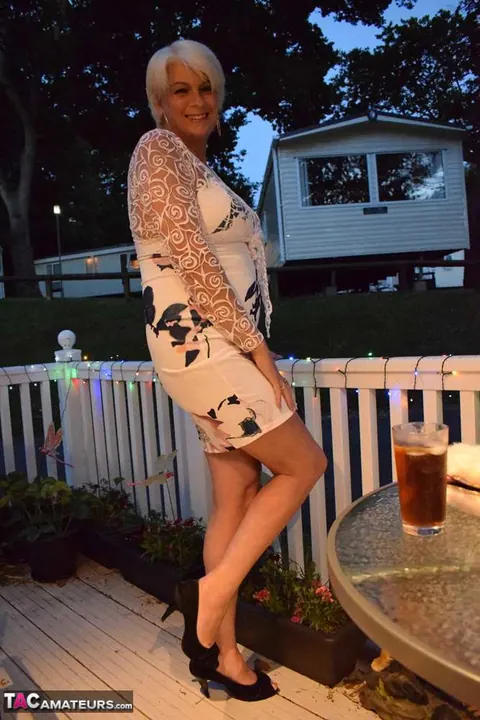 Curvy Blonde MILF Strips Off Her Skirt on the Patio – photo 17 of 20