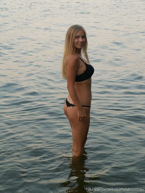 Busty Blonde Strips by the Lake and Eats an Apple – photo 10 of 16