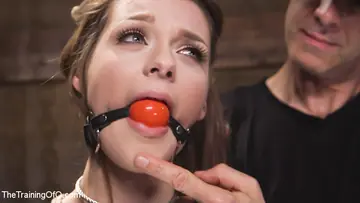 Redhead Deepthroats and Gets Fucked in Bondage Group Session