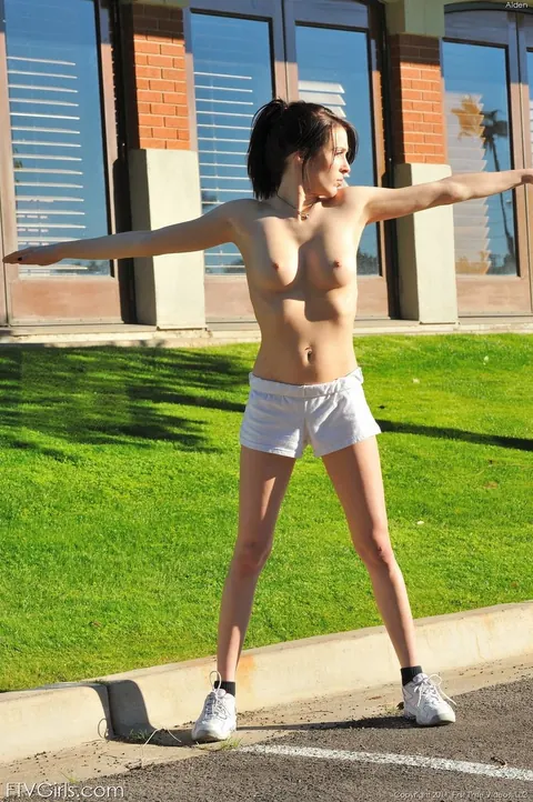 Brunette in Shorts Strips Naked and Spreads Her Shaved Pussy Outdoors – photo 7 of 15