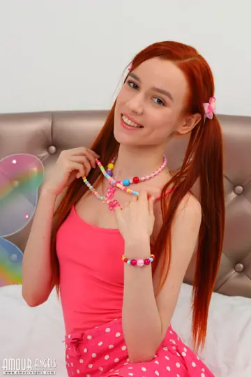 Skinny Redhead in Pigtails Strips and Spreads Her Pussy