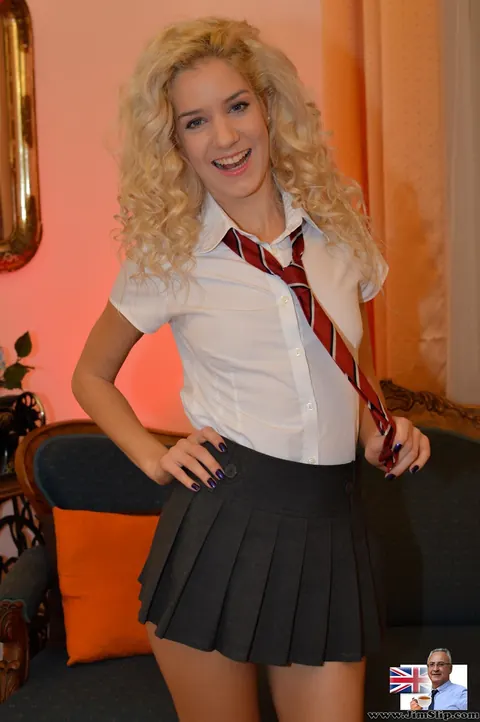 Monique Woods: Curly Blonde in a Skirt and Socks Shows Her Small Ass – photo 2 of 21