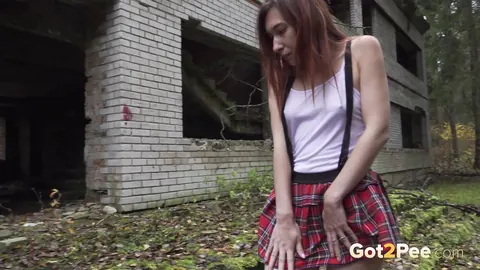 Woman in Boots Pulls Panties Aside to Pee Outdoors – photo 2 of 15