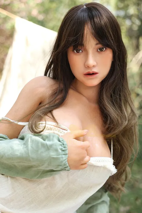 Asian Woman with Enhanced Tits Bares Her Body and Poses – photo 12 of 17
