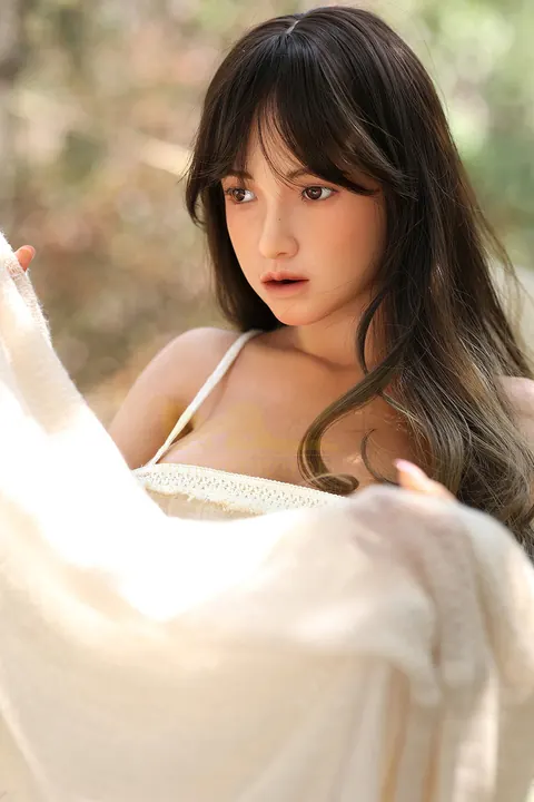Asian Woman with Enhanced Tits Bares Her Body and Poses – photo 11 of 17