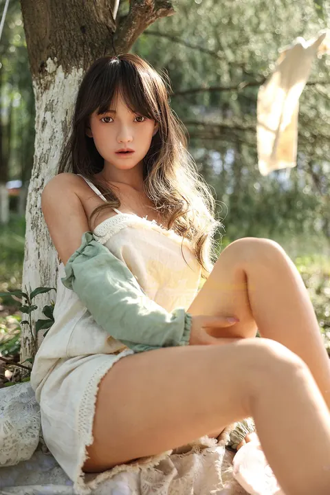 Asian Woman with Enhanced Tits Bares Her Body and Poses – photo 13 of 17