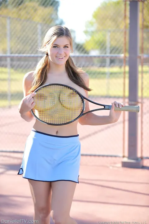 Busty Woman Strips Out of Her Tennis Uniform Outdoors – photo 15 of 21