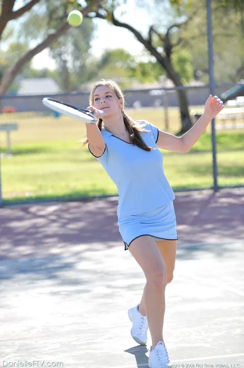 Busty Woman Strips Out of Her Tennis Uniform Outdoors – photo 3 of 21