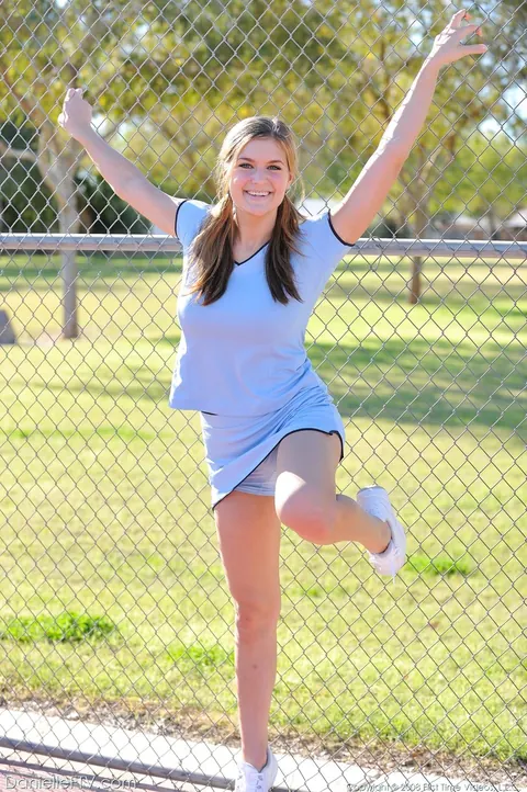 Busty Woman Strips Out of Her Tennis Uniform Outdoors – photo 19 of 21