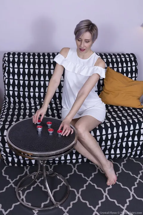 French Belle: Tall Pale MILF with Short Hair Spreads Her Hairy Crotch on the Sofa – photo 1 of 21