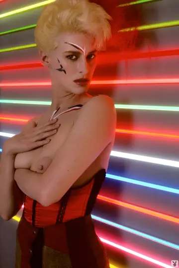 Short-Haired Woman Strips Out of Her Lingerie and Poses Nude