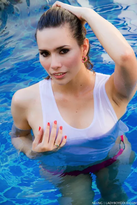 Thai Trans Woman Strips Out of Her Bikini by the Pool – photo 7 of 21
