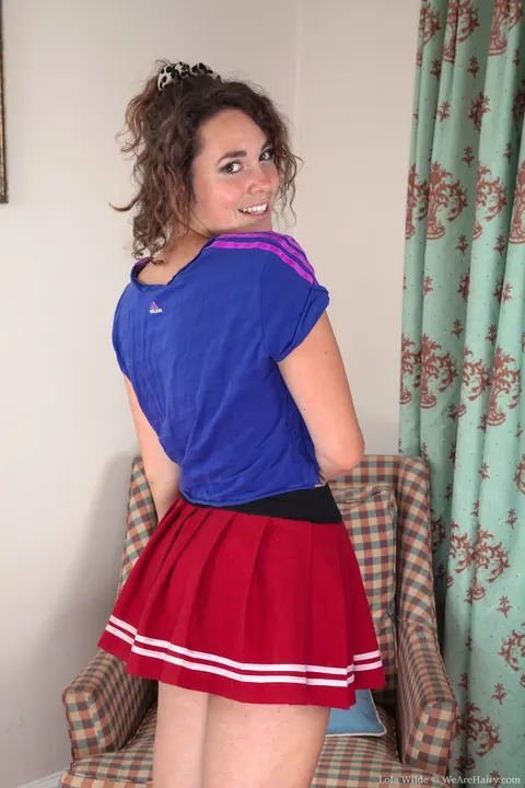 Lola Wilde: Hairy Amateur in Uniform Spreads Her Pussy – photo 1 of 21