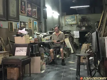 Asian Brunette in a Dress and Socks Gives a Sloppy Blowjob