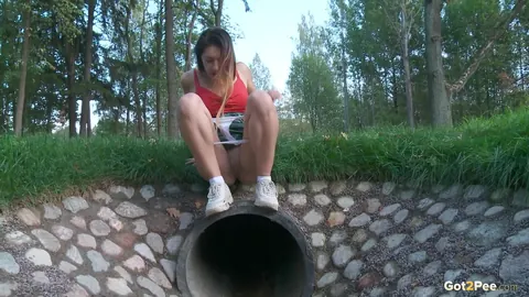 Diana Sweet: Brunette Lifts Her Skirt and Pees Over a Drainage Pipe – photo 6 of 15