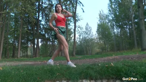 Diana Sweet: Brunette Lifts Her Skirt and Pees Over a Drainage Pipe – photo 2 of 15