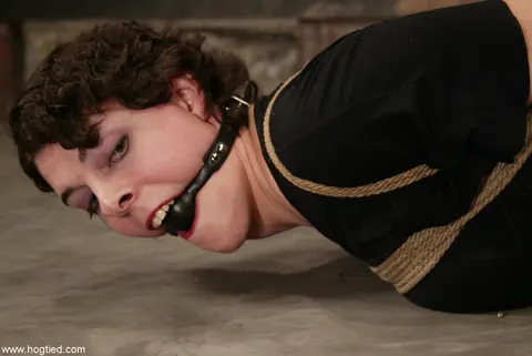 Brunette in a Skirt and Panties Spreads While Hogtied – photo 4 of 15
