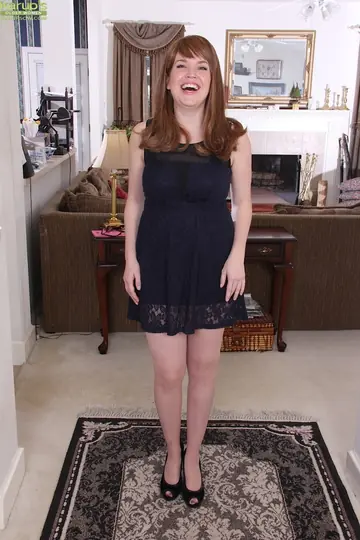 Curvy Redhead MILF Strips Out of Her Pantyhose and Spreads Her Hairy Pussy