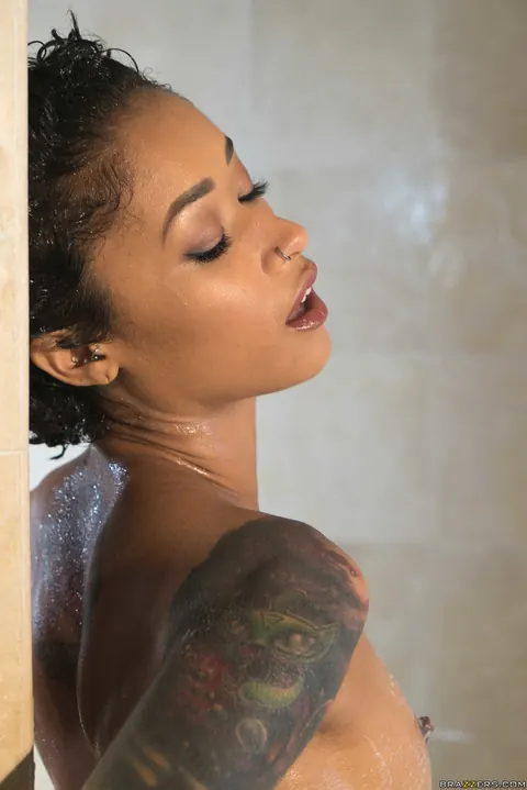 Skin Diamond: Slim Ebony Babe with Tattoos Strips and Spreads in the Bathroom – photo 8 of 20
