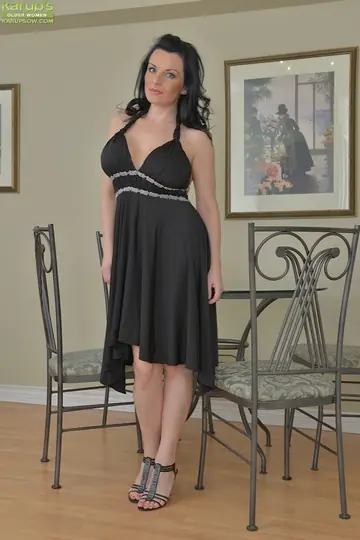 Busty Brunette MILF Lifts Her Skirt and Spreads Her Pussy in Heels