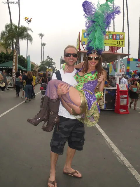 Anikka Albrite: Busty Blonde and Tall Brunette Flaunt Bodies in Carnival Costumes Outdoors – photo 11 of 20