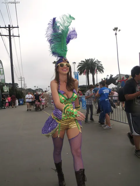 Anikka Albrite: Busty Blonde and Tall Brunette Flaunt Bodies in Carnival Costumes Outdoors – photo 10 of 20