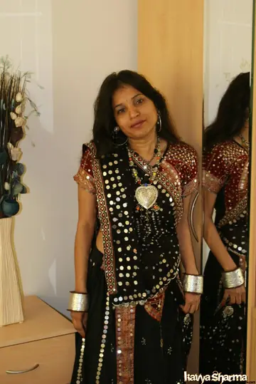 Busty Indian MILF Strips Out of Her Lingerie and Skirt and Spreads Her Pussy