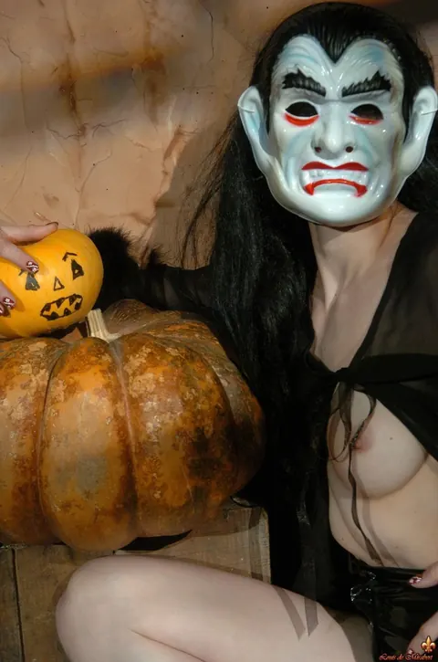 Brunette in Latex Shorts Shows Her Natural Tits for Halloween – photo 2 of 16