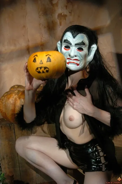Brunette in Latex Shorts Shows Her Natural Tits for Halloween – photo 5 of 16